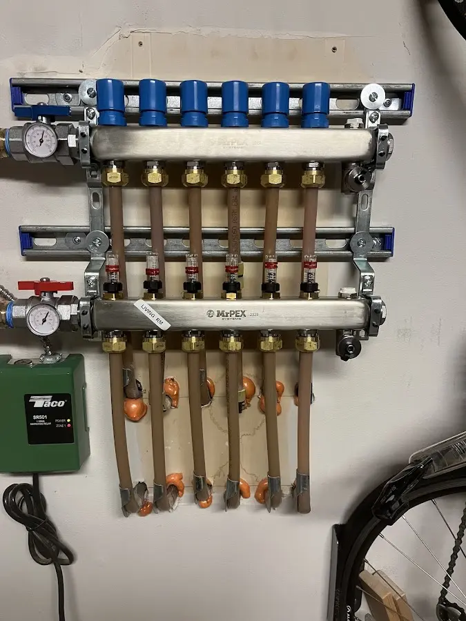 Plumber performing Water Heater Repair at a residential property in Hidalgo